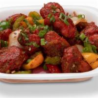 Gobi Manchurian (Dry) · Crisp paneer tossed with ginger, vegis, and our signature manchurian sauce.