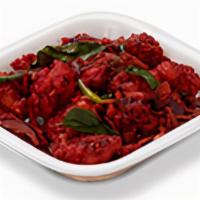 Gobi 65 Dry · Crisp cauliflower tossed with curry leaves, spices and sechwan sauce.