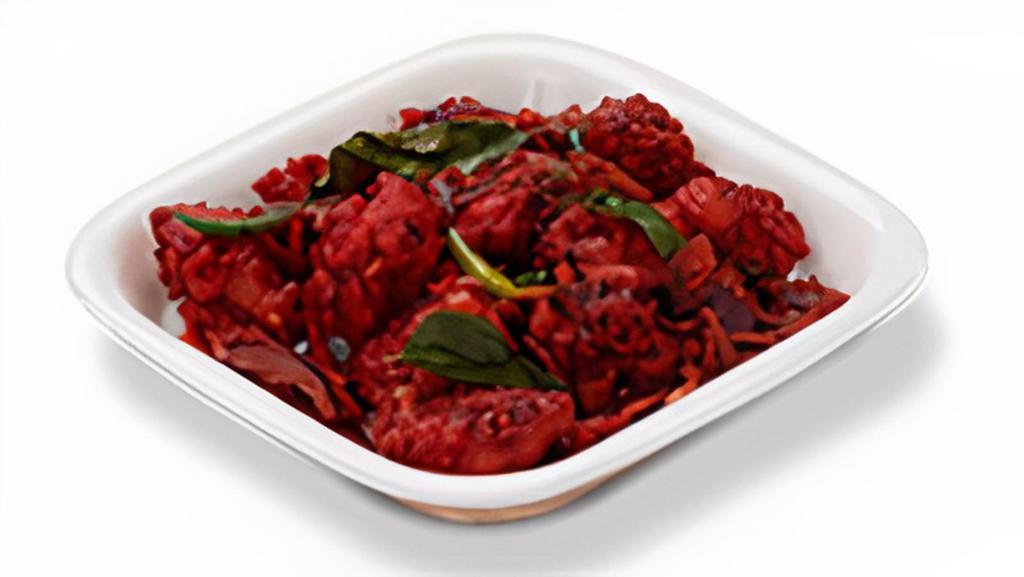 Gobi 65 Dry. · Crisp cauliflower tossed with curry leaves, spices and sechwan sauce.
