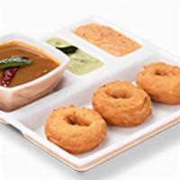 Vada Sambhar.. · Spiced savory lentil dumplings, served with aromatic sambhar.