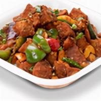 Chili Idly. · Fried idly cubes tossed in tangy choley, bell peppers, and our very own Manchurian sauce