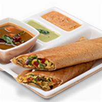 Paneer Bhurji Dosa Wrap. · Shredded paneer and aromatic spices with onions and tomato.
