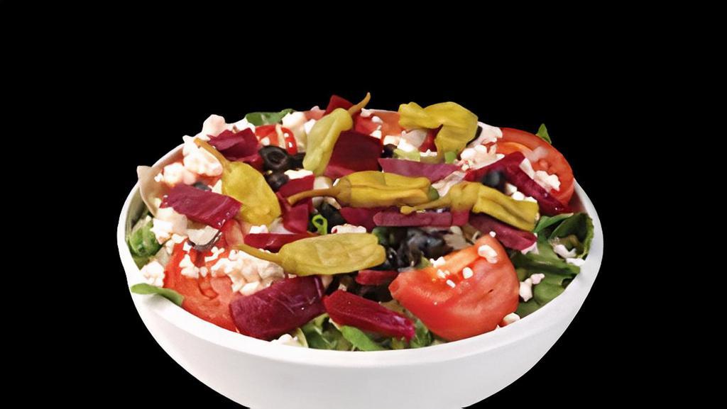 Greek Salad · Lettuce, tomatoes, onions, pepperoncini peppers, beets, black olives and feta cheese.