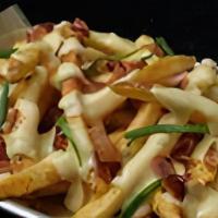 Pile Of Fries · Natural-cut fries, gouda cheese sauce, bacon, chives
