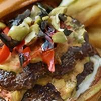 Pimento & Olive · Pimento Cheese, olive tapenade, roasted red peppers

Served on a butter grilled bun with tru...