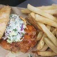 Tennessee Hot Chicken · Southern fried chicken breast, Tennessee hot sauce, pickles, truffle mayo, kale crunch cilan...