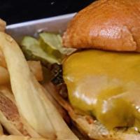 Kid Cheeseburger · Cheddar Cheese

Kids meals include option of apple juice, chocolate milk, or kids soda.

Chi...