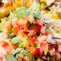 Cheezy Nacho Beef Platter · Tortilla chips smothered with shredded beef and nacho cheese, guacamole, pico de gallo, and ...
