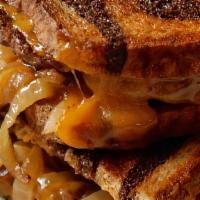 Patty Melt On Rye · American cheese, grilled onions, Thousand Island dressing, and pickle