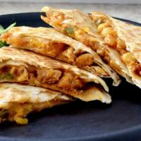 Grilled Chicken Quesadilla · Rice and beans, sour cream, jack and cheddar, pico de gallo