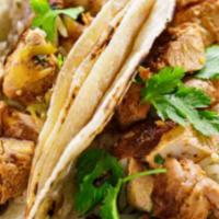 Three Chicken Tacos · Rice, beans, pico de gallo, and salsa