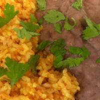 ½ Mexican Rice And ½ Refried Beans · 