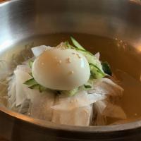 Cold Bibim Naeng Myeon · Spicy buckwheat noodles, egg, cucumber, pickled radish, chili sauce.