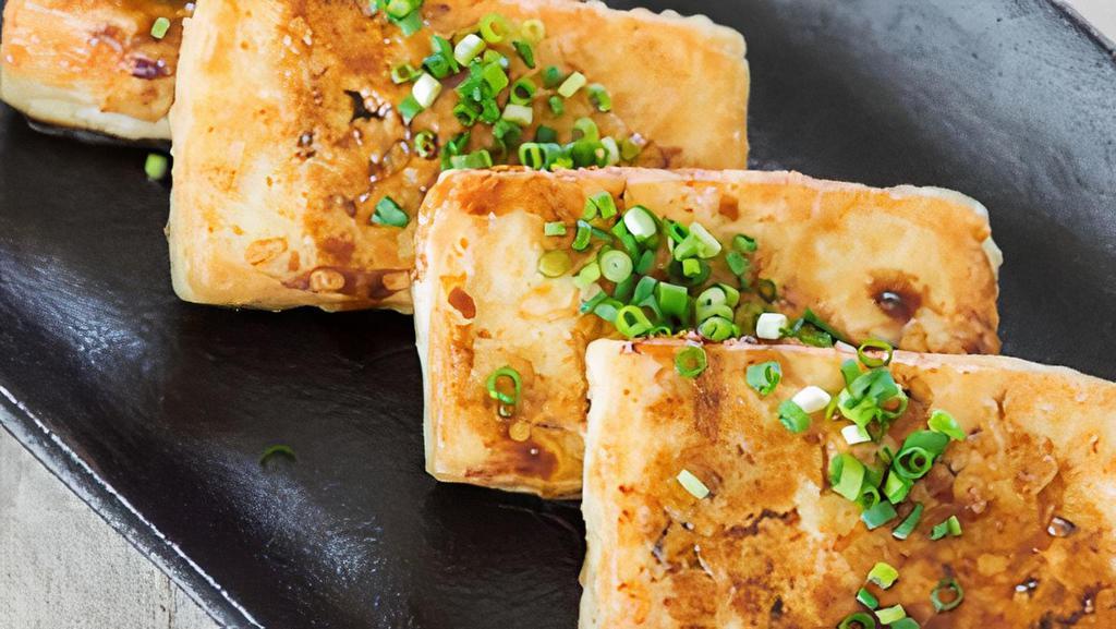 Tofu Deep Fried  · Tofu deep fried with sriracha sauce and sweet chili sauce .