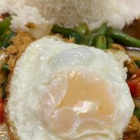Pad Ka Prao · Your choice of meat, spicy Thai stir fired ground meat with sweet basil leaves, onions, long...