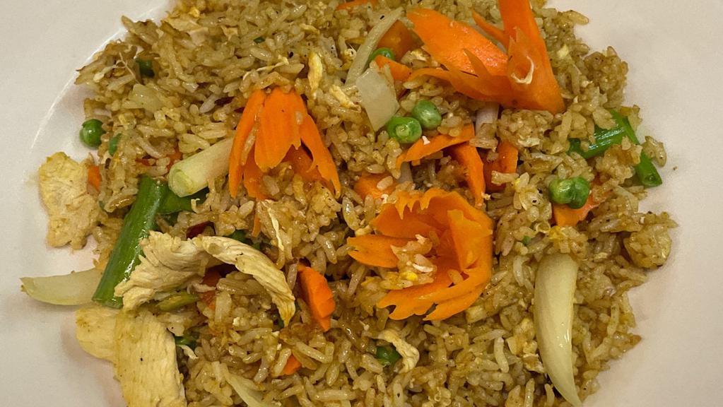 Curry Fried Rice · Onions,pea pod,broccoli,carrots ,curry powder and your choice of meats.