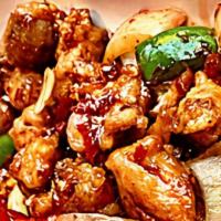 Chili Chicken · Bell pepper, onions,green onions,chili medium spicy and your choice of meats.