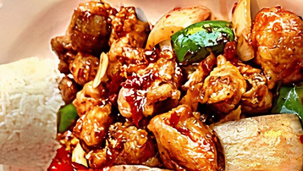 Chili Chicken · Bell pepper, onions,green onions,chili medium spicy and your choice of meats.