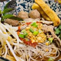 Boat Noodles  · Thai style pho mix with beef blood, bean sprouts, green onions, cilantro, meatballs and beef.