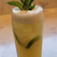 Coconut Lime Refresher · Sweet coconut syrup, fresh limes, lemonade and green tea shaken together