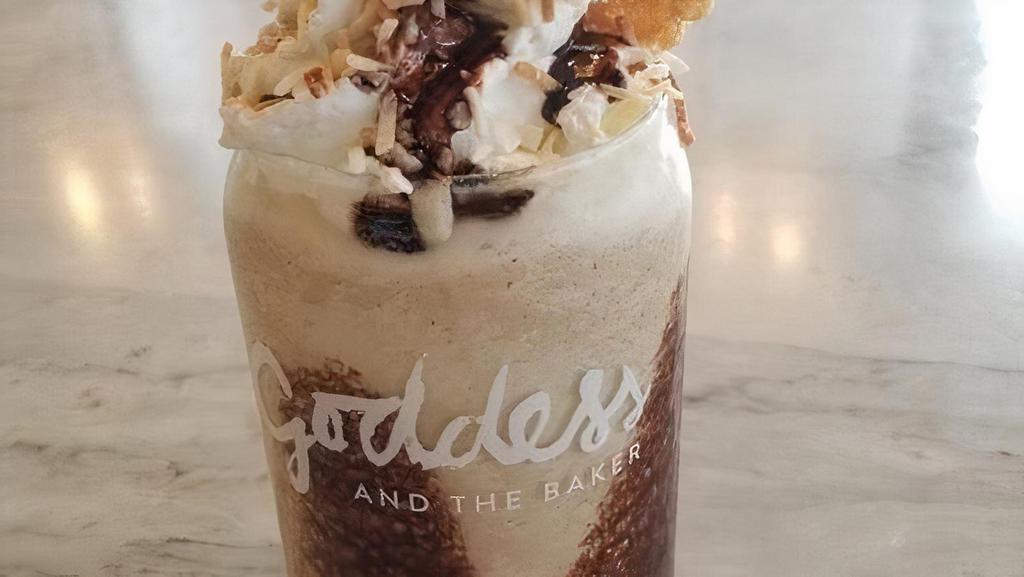 Frozen Coconut Caramel Coffee · Blended coffee with chocolate sauce, caramel sauce, toasted coconut and a cookie wafer.