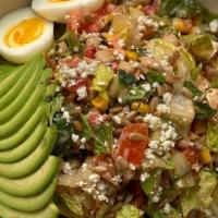 Baker'S Chopped Salad · romaine, avocado, diced tomato, garbanzo beans, cucumber, corn, carrot, red peppers, blue ch...