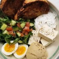 Mediterranean Bowl · Arugula Salad tossed with quinoa, tomatoes, cucumber in lemon vinaigrette, 6-minute egg, hum...