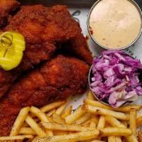 Tenders Nashville · Three Nashville crispy tenders with fries, house-made slaw, pickles and buttermilk ranch dip...