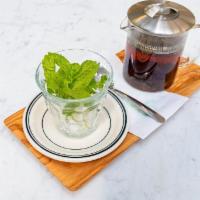 Persian Tea · black tea poured over fresh mint and sugar cubes