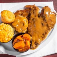 Baked Whole Turkey Wing W/Dressing  · Baked Whole Turkey Wing w/Dressing & your choice of two sides & Cornbread Muffin