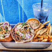 Street Cart Doner Wrap Combo Meal · Garlic aioli, fried lavash chips, romaine, cabbage, tomato, onion, green pepper, cucumber, a...