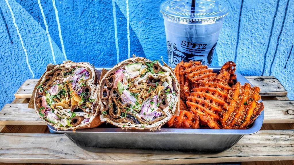 Berliner Doner Wrap Combo Meal · Berliner red sauce, feta, cabbage and carrot slaw, sumac, tomato, onion, cucumber, corn and tzatziki + SIDE + DRINK