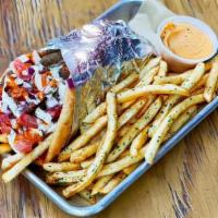 Street Greek Gyro Combo Meal · Choice of protein with zesty feta, berliner sauce, tzatziki, onion, tomato and french fries....