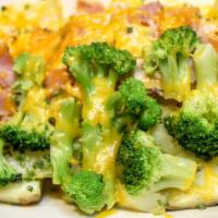 Broccoli & Cheese Spud · Prepared with butter, chives and sour cream.