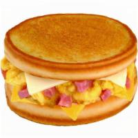 Sourdough Ham & Cheese Omelet · Scrambled Eggs and Ham cooked together, American & Swiss cheese on butter toasted sourdough