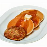 Pancakes W/ Sausage · Three buttermilk pancakes served with maple syrup, butter and a side sausage