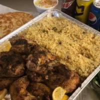 Family Grecian Chicken Dinner · Two half chickens, four quarter legs, on a bed of Rice Pilaf, Ov. Potatoes, Lg. Greek Salad,...