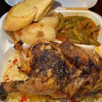 Half Chicken Dinner · Half chicken Marinated Greek Style. 
Served with Rice Pilaf, Oven Potatoes, Vegetable, and G...