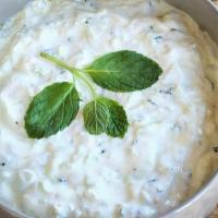 Tzatziki · Our signature sauce!!! 
 Greek Yogurt with fresh Dill, Garlic, Olive Oil and Cucumber.