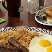 2 Eggs With Sausage Link · Served with Hash Browns or Fruit. Choice of Toast or Pancakes.