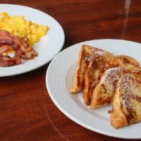 French Toast Combo Meal · French toast, (2) eggs & choice of bacon, sausage or ham. Add egg, bacon, ham for an additio...