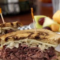 Reuben Sandwich · Corned Beef, Sauerkraut, Swiss Cheese & Side of Thousand Island on Grilled Rye.