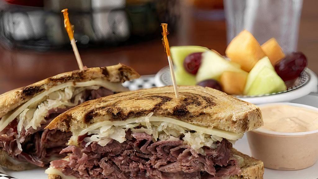 Reuben Sandwich · Corned Beef, Sauerkraut, Swiss Cheese & Side of Thousand Island on Grilled Rye.