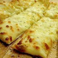 Cheesy Garlic Sticks · Made out of our signature hand-tossed dough. Covered with a creamy garlic sauce, mozzarella ...