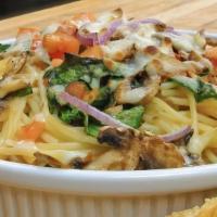 Spinach & Garlic Spaghetti · Spinach, mushrooms, red onion, and tomato. Served with our creamy garlic sauce and topped wi...
