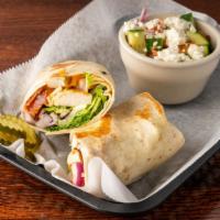 California Wrap · Chicken, avocado, bacon, and Cheddar, with lettuce, tomato, and onion. Served with potato ch...
