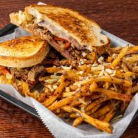 The Flatiron Cuban · Roasted spiced pork, ham, swiss, giardiniera, and spicy yellow mustard on grilled sourdough....