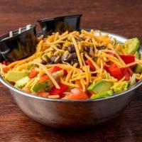 Southwest Chop Salad · Chopped romaine, roasted corn and black bean salsa, tomato, avocado, red bell pepper, and sh...