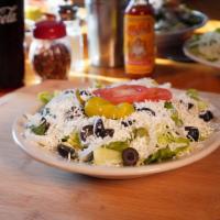 Greek · Vegetarian. Romaine and iceberg lettuce mix, onions, sliced California black olives, fresh f...