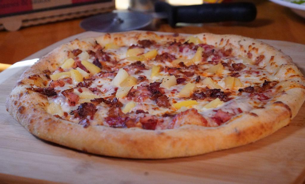 Hawaiian Special · Greek's® Italian sauce, special BBQ sauce, baked ham, select blended cheeses, Indiana bacon, & pineapple chunks.